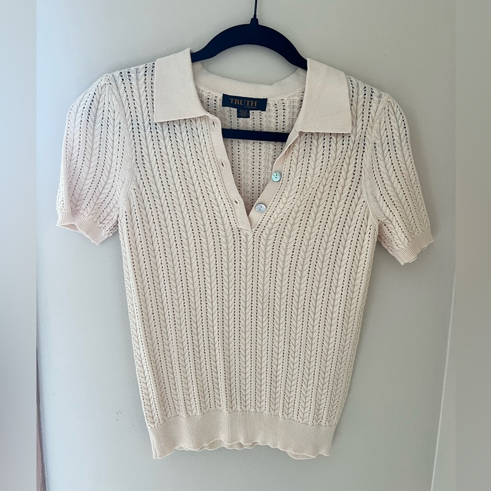 Cream knit sweater top.